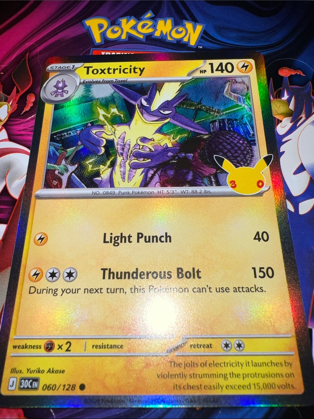 Pokemon Toxtricity Holographic Card - Yellow, Purple, Blue